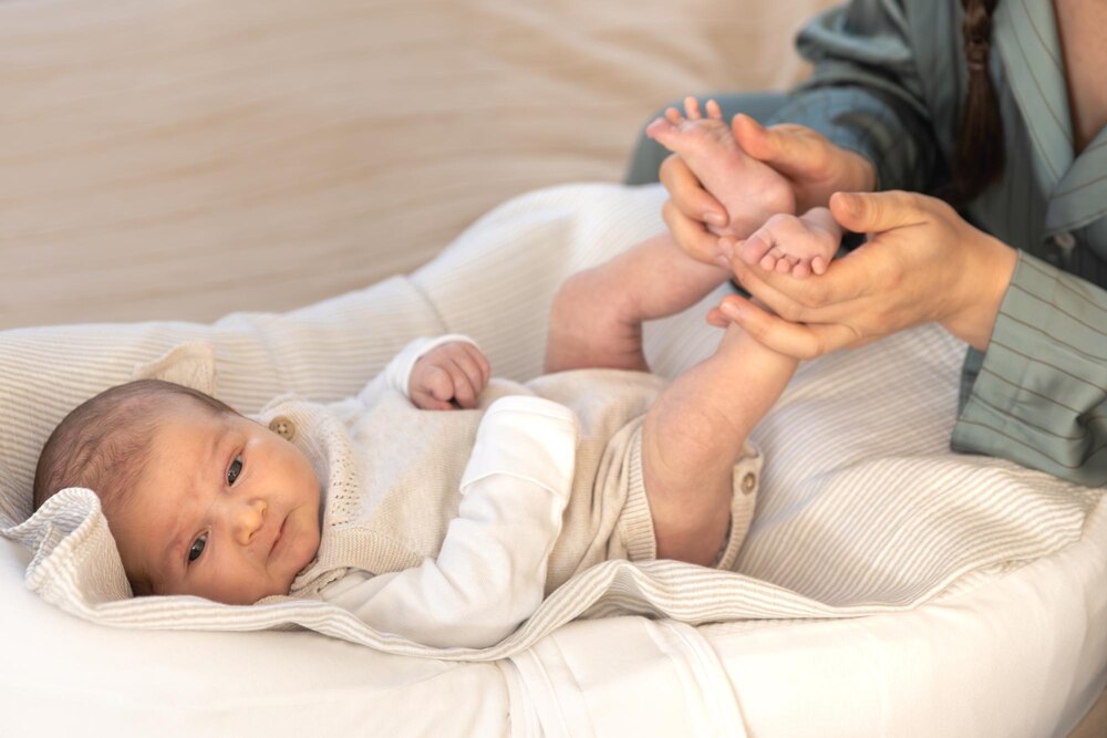 A young mother with a newborn baby newborn baby