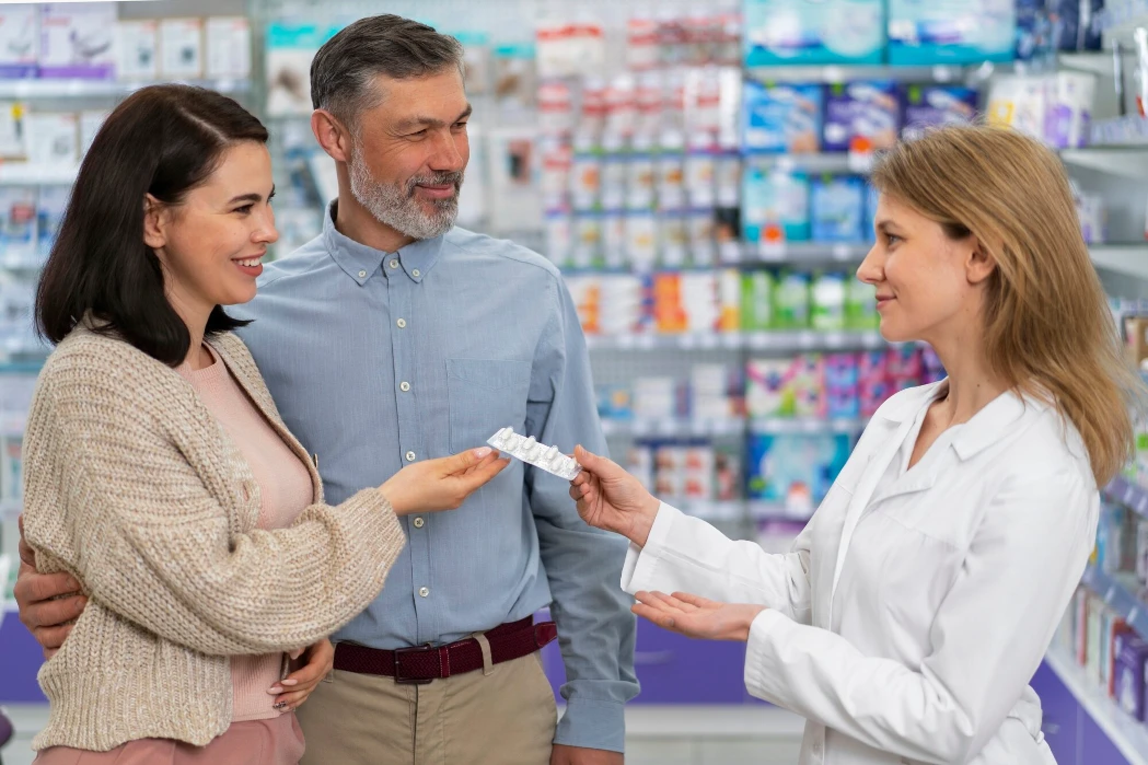 Medium shot pharmacist helping patient